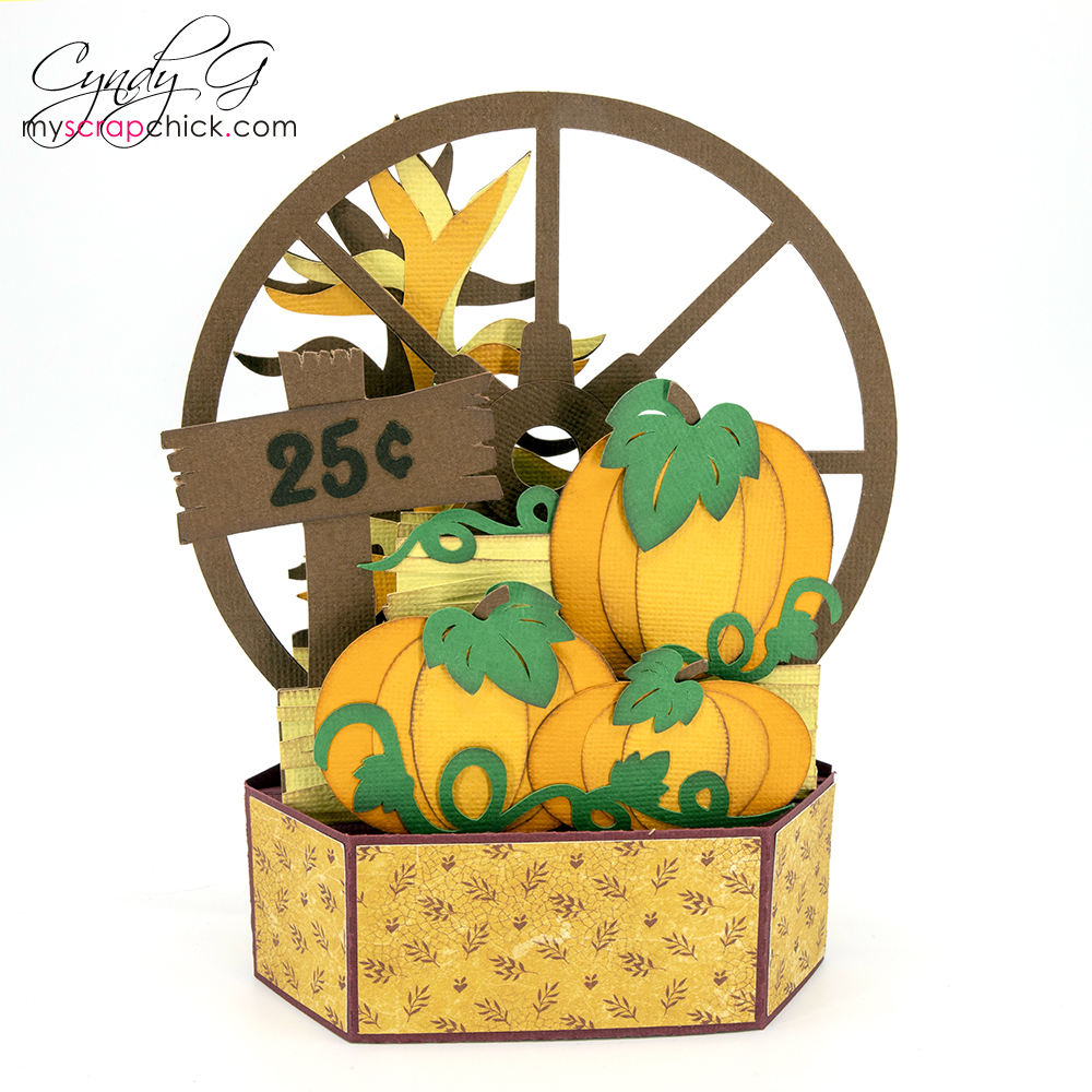 Card with wagon wheel and pumpkins